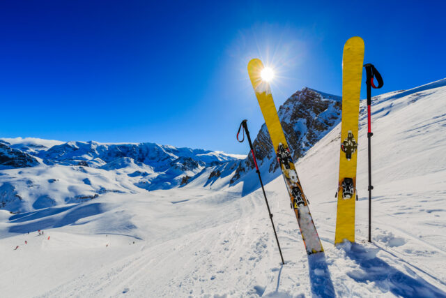 Ski In Winter Season, Mountains And Ski Touring Equipments On Th